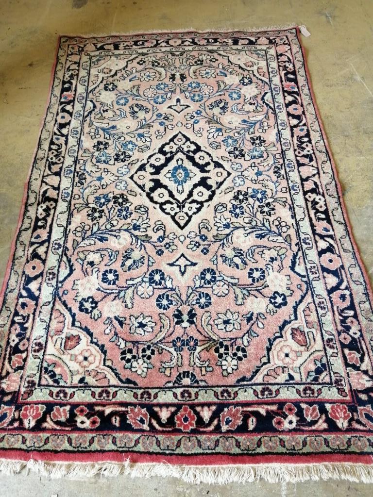 A Tabriz pale red rug, 206 x 127cm